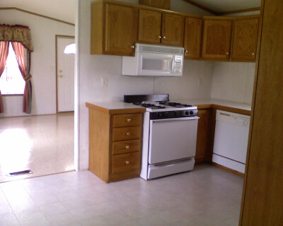 View of kitchen/living room of 14633 National Dr.
